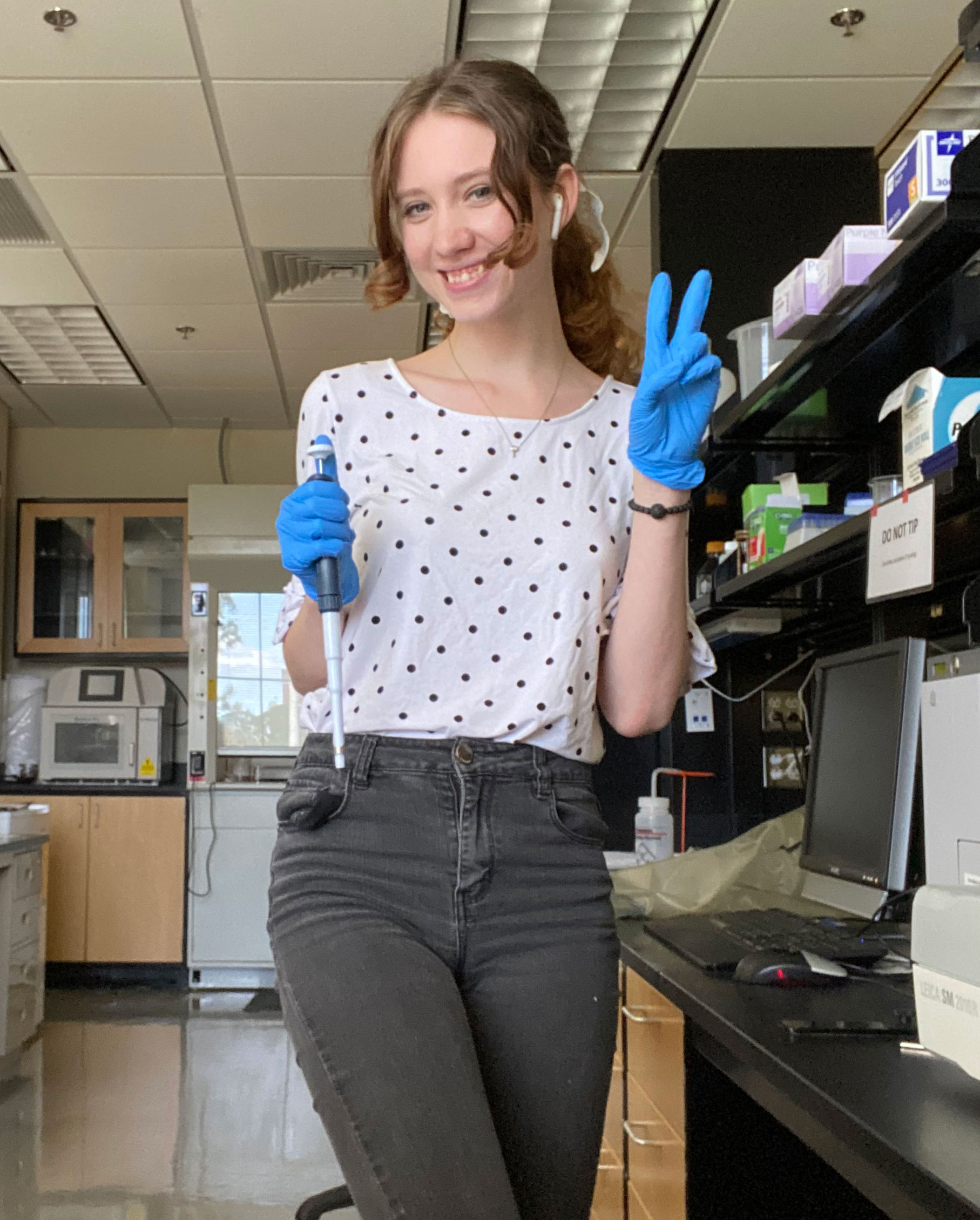 Student Jordan Ogg works in a lab