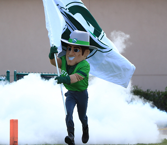 New John B mascot runs onto the field