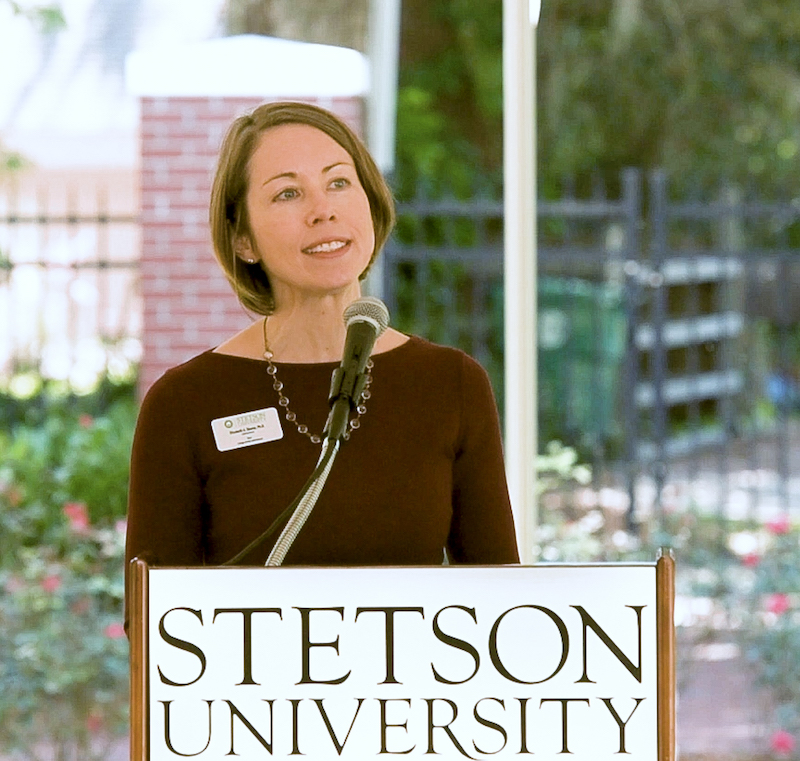 Dean Skomp speaks at the podium during announcement about $15M for scholarships