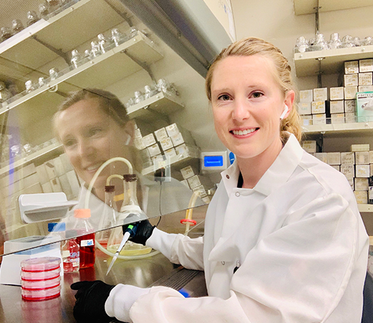 Dr. Kristine Dye works in her lab