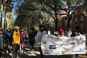 Participants march in the MLK Day march.