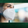 A woman wears a respirator to protect against COVID-19.