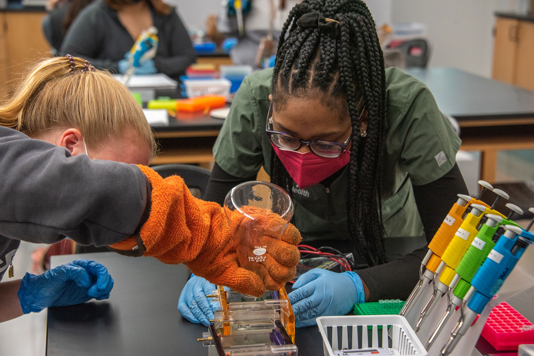 Student Briana Hall works with a DNA sample in Sage Hall.