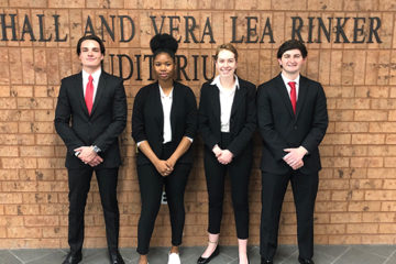 group photo of four students on ethics team.