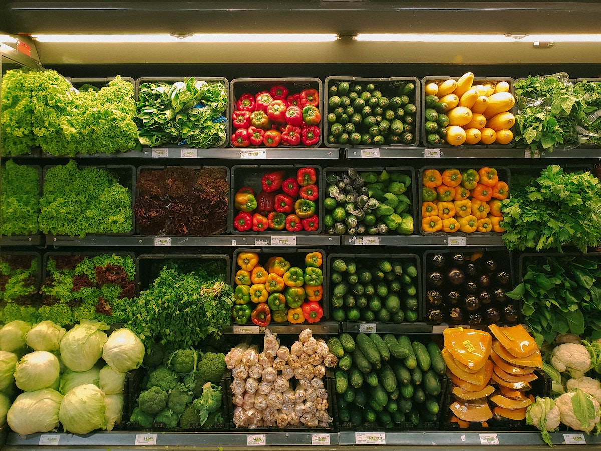 grocery story aisle with fresh produce for combating obesity