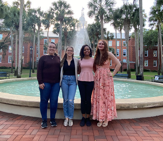 Group photo in front of the fountain in Palm Court