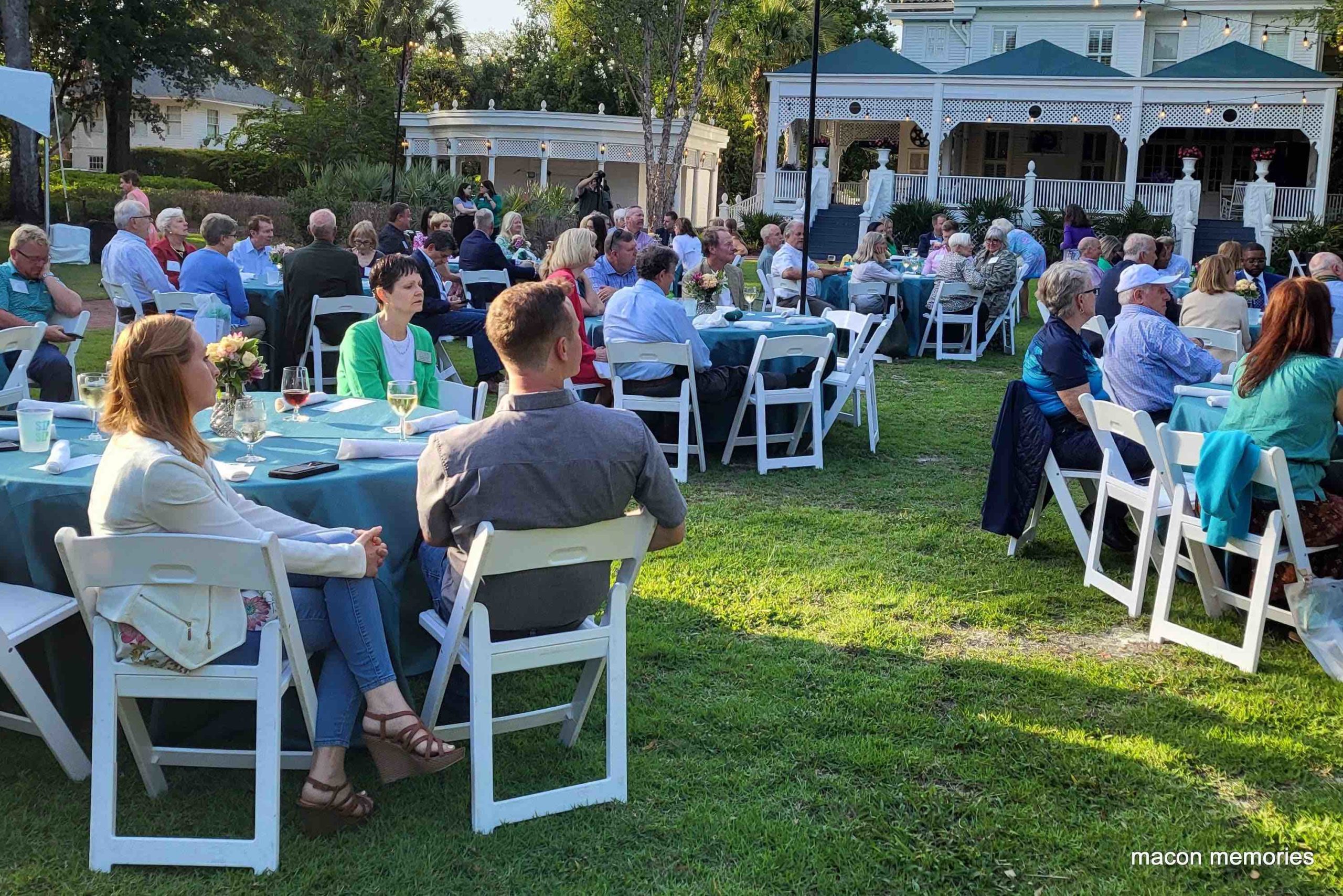 People gather in the graden beside the Stetson President's Home