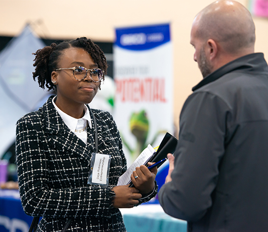 A student talks to a job / internship recruiter.