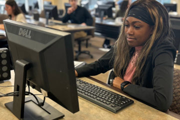 A student works at a computer