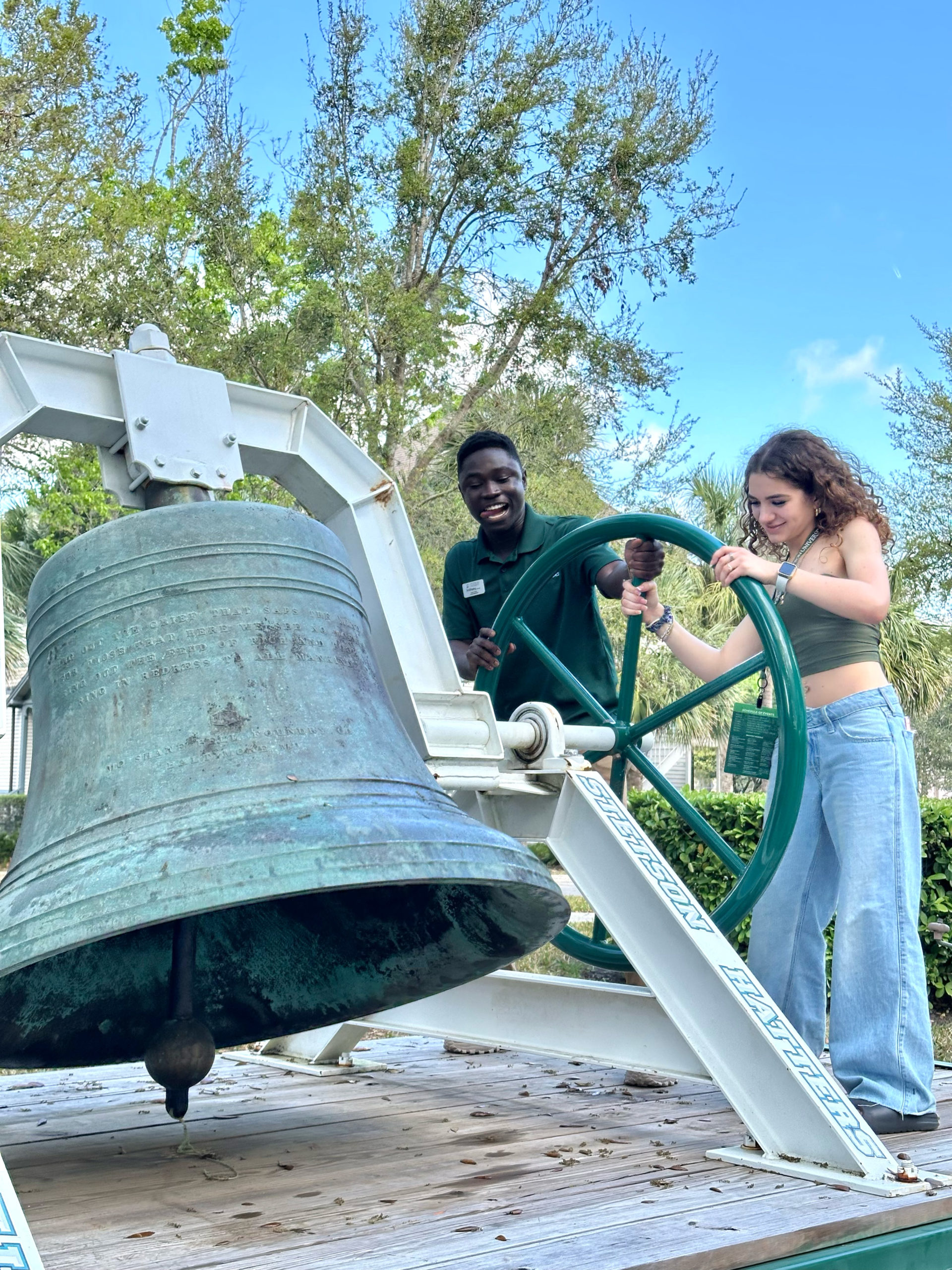 On Hatter Saturday, accepted students ring the Victory Bell