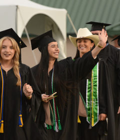 Students line up for Commencement for graduate degrees