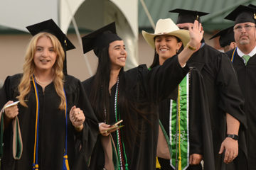 Students line up for Commencement for graduate degrees