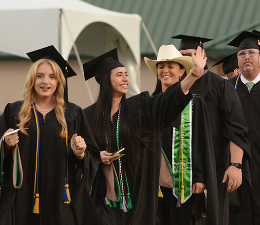 Students line up for Commencement for graduate degrees