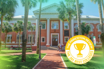 An academic building on campus with a graphic badge that says Best 391 Colleges by the Princeton Review