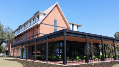 The exterior of a four-story brick building