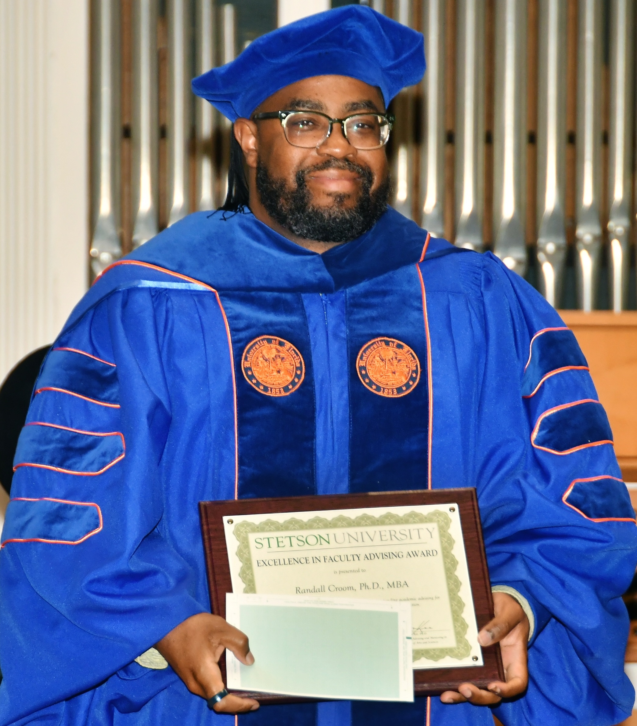 portrait in cap and gown