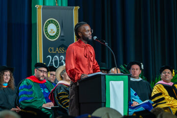 Junior Nyong'o at the podium during Stetson's Convocation 2026