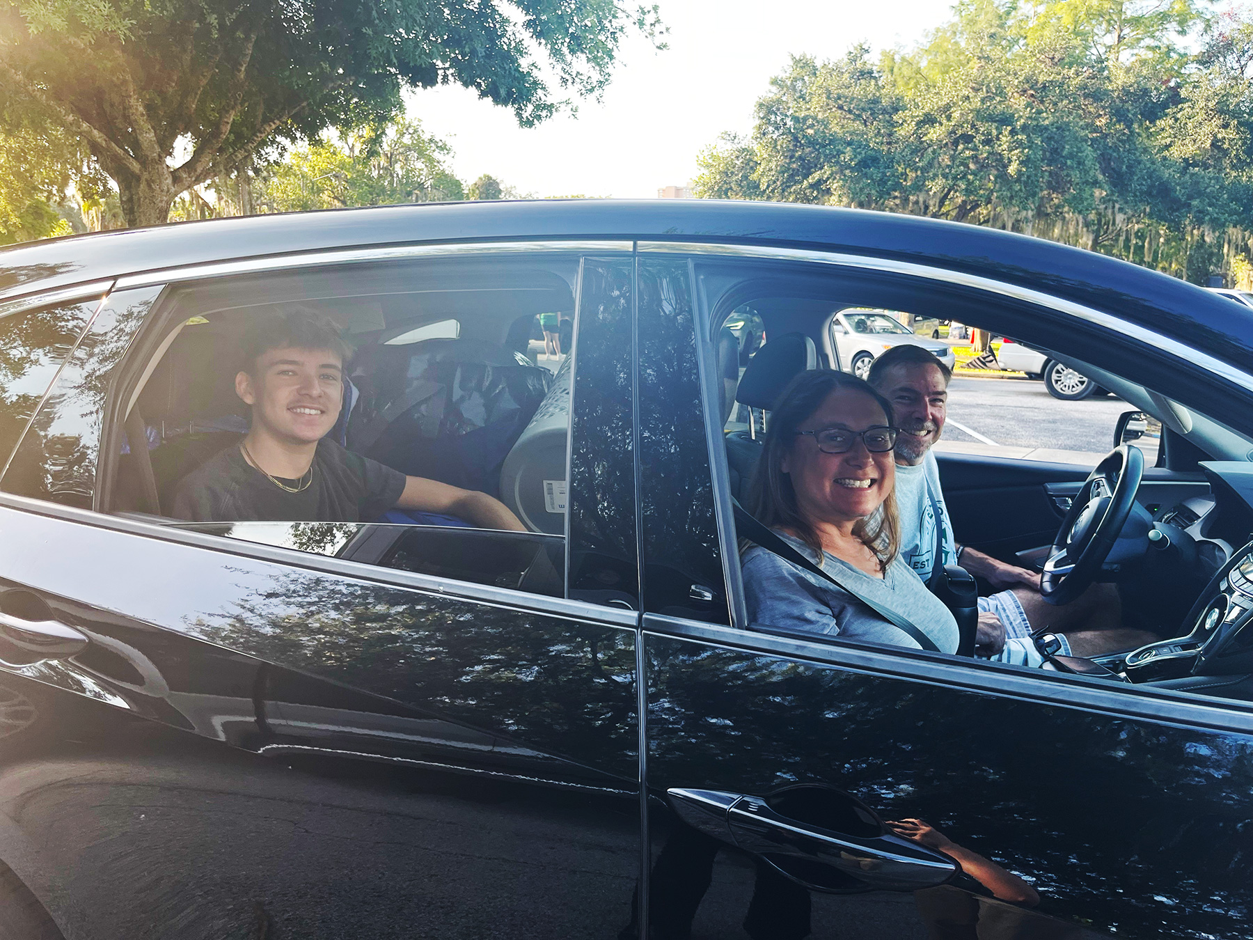 Logan Jones and his parents on Stetson's move-in day