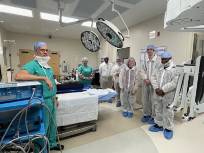 Hospital staff and interns in the surgical suite