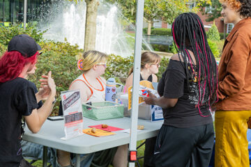 Five people around Stetson Votes Week informational tabling