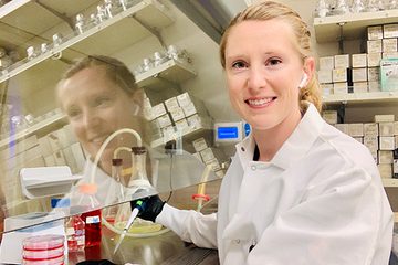 Dr. Kristine Dye working in a laboratory