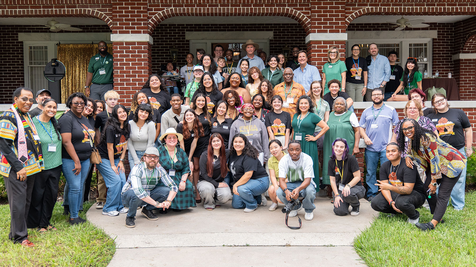 Group photo of MSC Homecoming attendees in front of the Cross-Cultural Center building