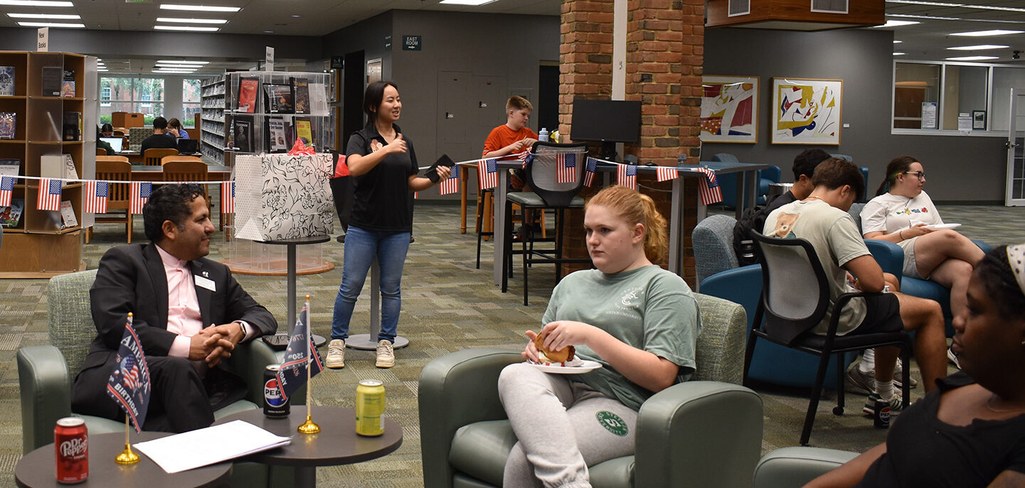 Multicultural Student Council president moderating Open Book event